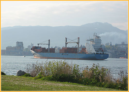 Shot of freighter in Burrard Inlet, taken from New Brighton Park in Vancouver